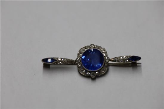 An early 20th century French platinum, sapphire and diamond bar brooch,